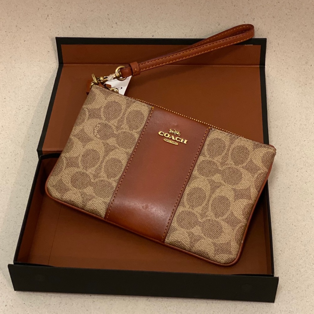 Brown wristlet in colorblock signature canvas